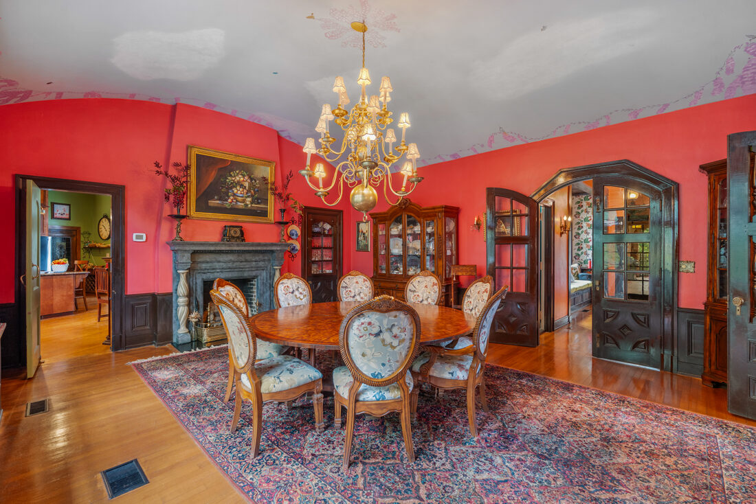 Formal dining room lit by the Newberry Opera House chandelier