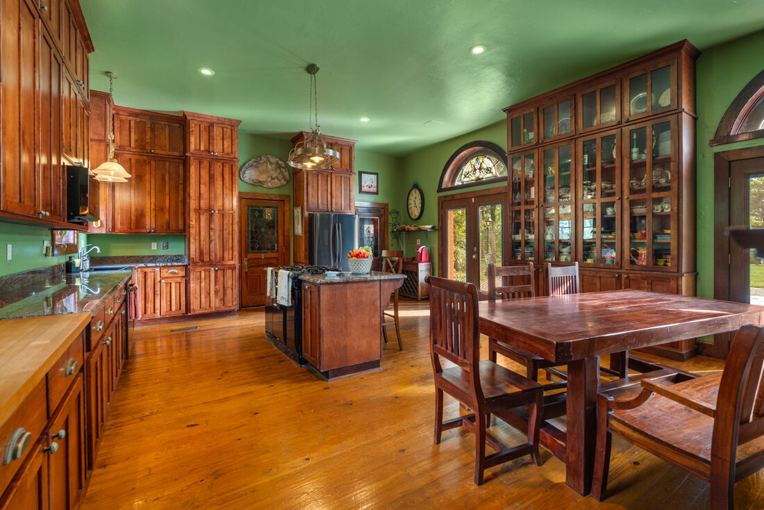 Chef's kitchen with custom cabinetry and center island